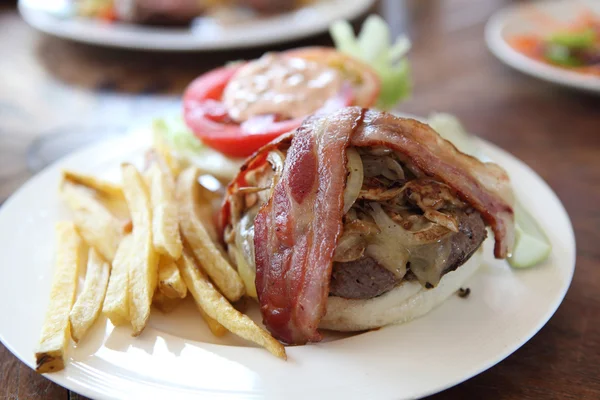 Hamburger with fries and salad — Stock Photo, Image