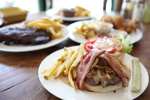 stock image Hamburger with fries and salad