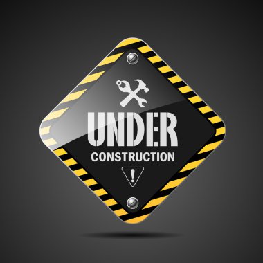 Under construction sign on black background clipart