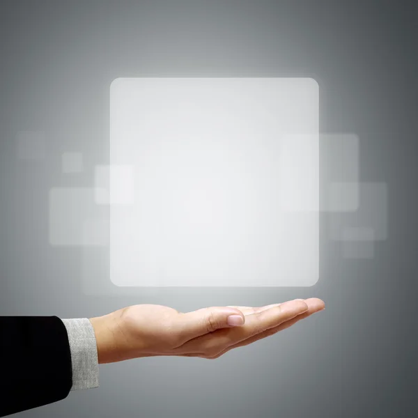 Rahmen weißes Quadrat über der Geschäftshand Stockbild