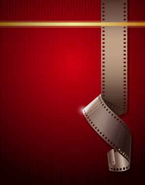 Camera film roll on wallpaper red background clipart