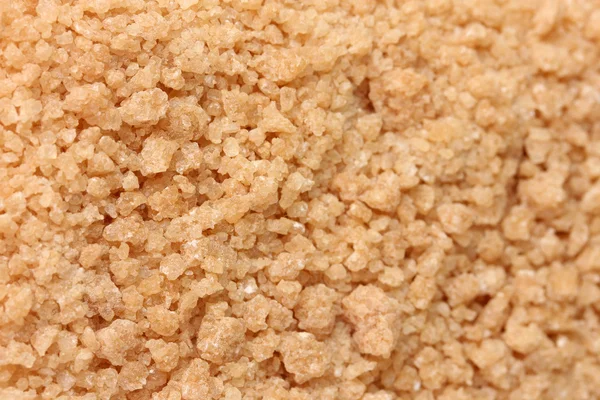 Brown cane sugar background close-up — Stock Photo, Image
