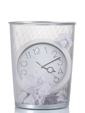 Wall Clock in metal trash bin and paper isolated on white clipart