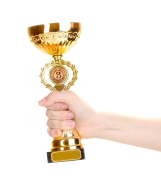 Trophy cup in hand isolated on white clipart