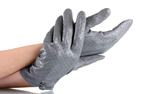 Kadınların elleri gri deri üzerinde beyaz izole eldivenler — Stok fotoğraf