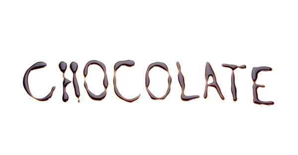 Inscriptie chocolade op wit wordt geïsoleerd — Stockfoto