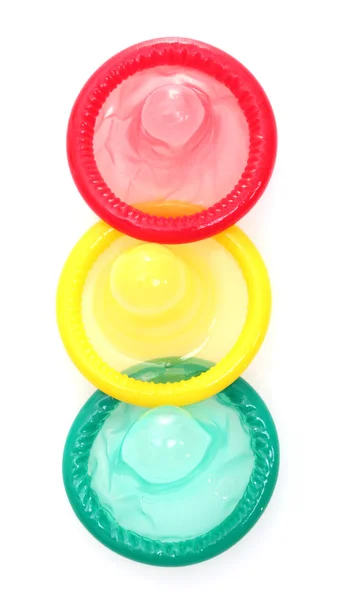 Färgglada kondomer isolerad på vit — Stockfoto