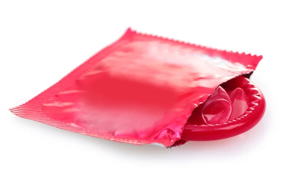 Preservativo vermelho com embalagem aberta isolada em branco — Fotografia de Stock