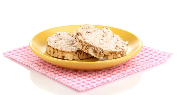 Хлебные закуски на блюдце с салфеткой изолированы на белом — стоковое фото