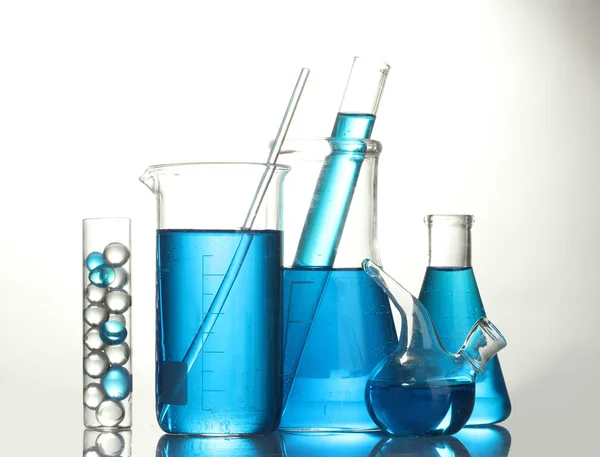 Test-tubes with blue liquid isolated on white — Stock Photo, Image