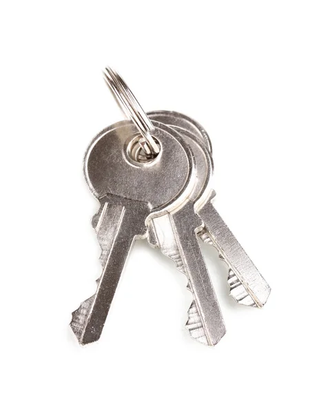 Drei Schlüssel auf Metallring isoliert auf weiß — Stockfoto