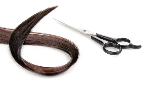 Shiny brown hair and hair cutting shears isolated on white — Stock Photo, Image