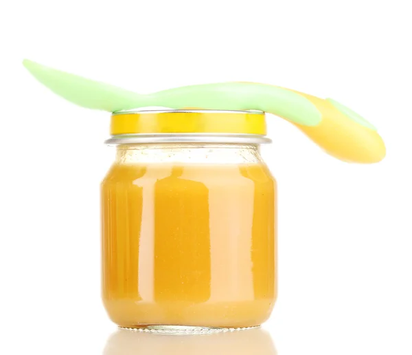 Jar of baby puree with spoon isolated on white — Stock Photo, Image
