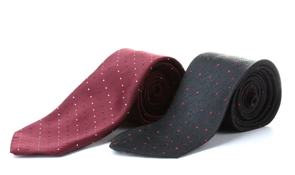 Czarne i czerwone krawaty walcowane na białym tle — Zdjęcie stockowe