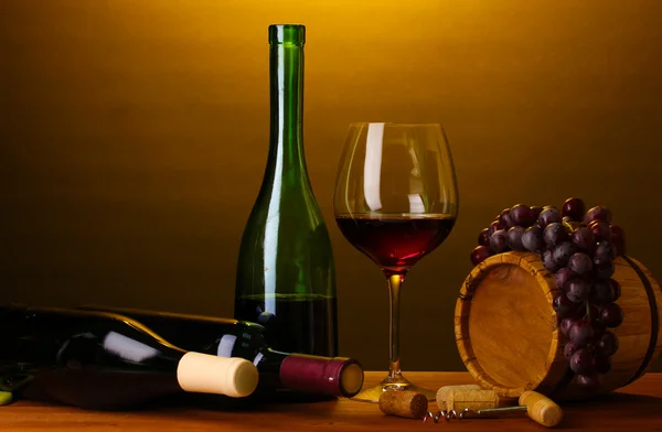 In wine cellar. Composition of wine bottles and runlet — Stock Photo, Image