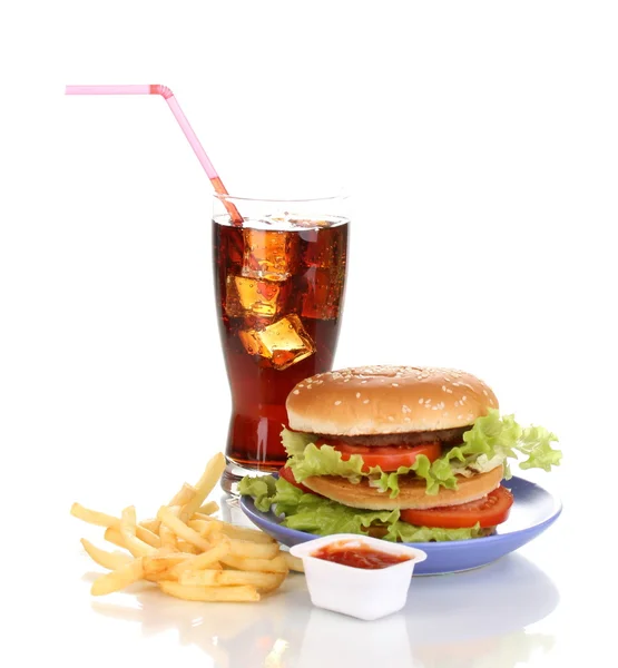 Big and tasty hamburger on plate with cola and fried potatoes isolated on white — Stock Photo, Image
