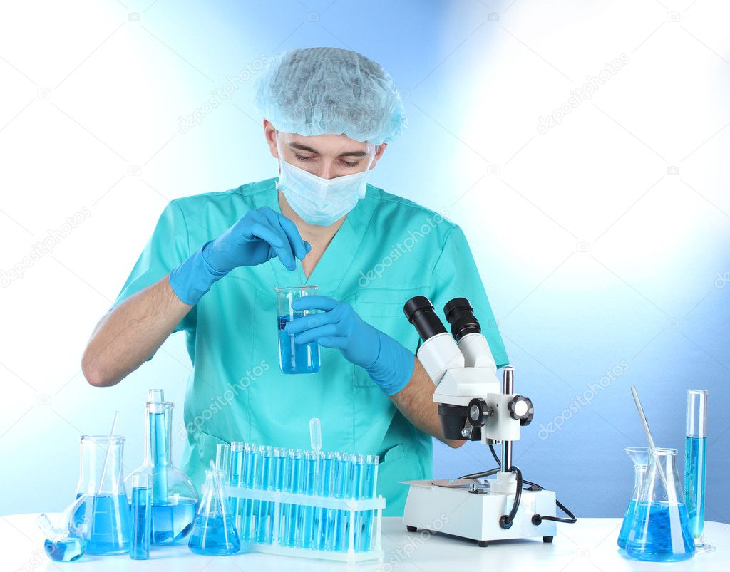 Scientist in the lab working with chemicals test-tubes