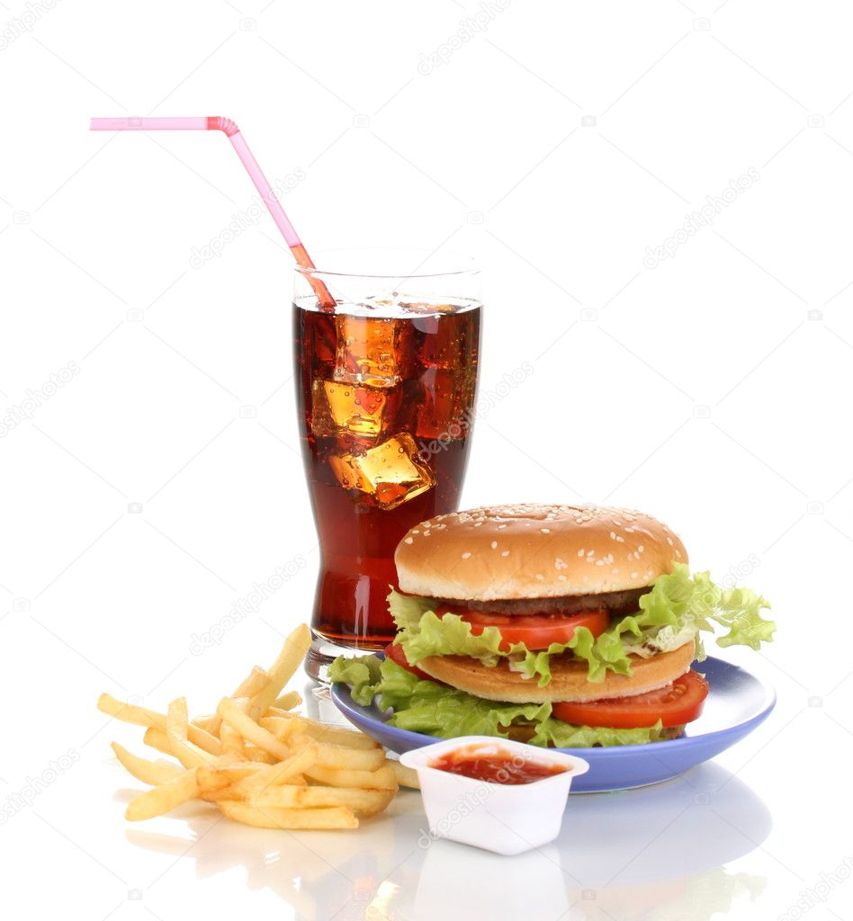 Big and tasty hamburger on plate with cola and fried potatoes isolated on white