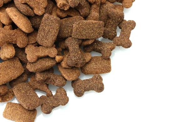 Alimento de cão seco isolado em branco — Fotografia de Stock