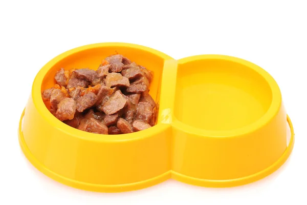 Yellow bowl with cat food and water isolated on white — Stock Photo, Image