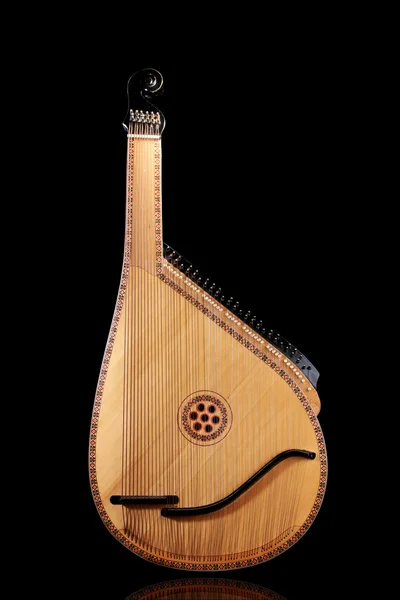 Retro bandura- Ukrainian musical instrument on black background — Stock Photo, Image
