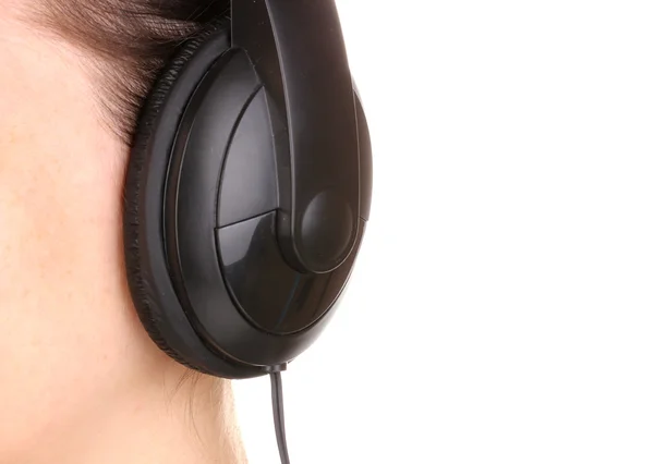 Menschliches Ohr mit Kopfhörer in Großaufnahme isoliert auf weiß — Stockfoto