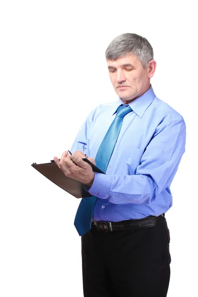 Uomo d'affari che scrive su documento isolato su bianco — Foto Stock
