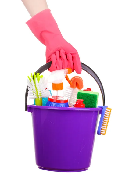 Bucket with cleaning items in hand isolated on white — Stock Photo, Image
