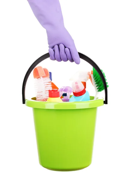Hink med rengöring objekt i hand isolerad på vit — Stockfoto