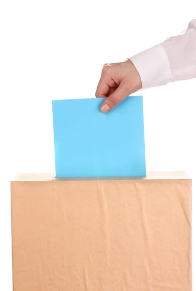 Mão com cédula de voto e caixa isolada em branco — Fotografia de Stock