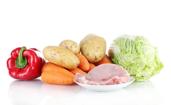 Fresh vegetables and pork steak isolated on white — Stock Photo, Image