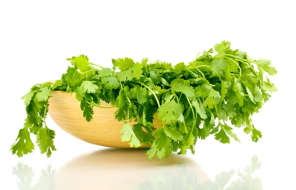 Fresh coriander or cilantro in wooden bowl isolated on white — Stock Photo, Image
