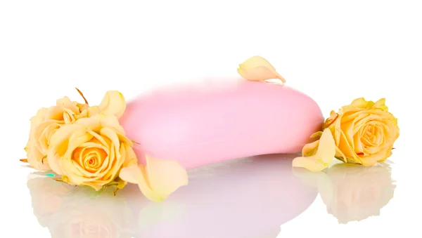 Seife mit Rosen auf weißem Hintergrund — Stockfoto