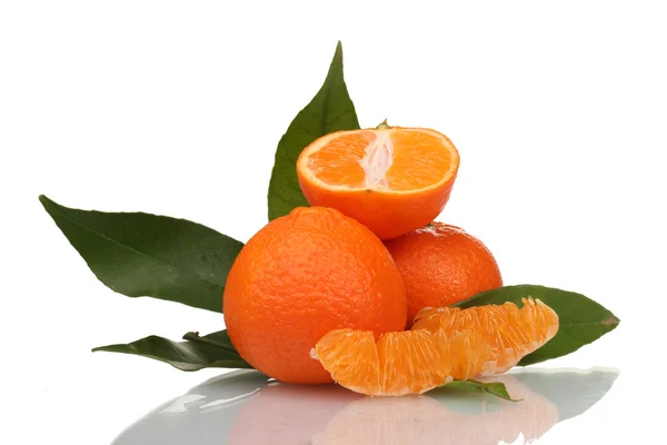 Ripe tasty tangerines with leaves and segments isolated on white — Stock Photo, Image