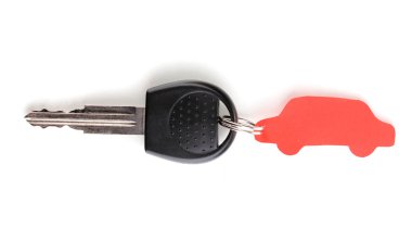 Car key with charm isolated on white clipart