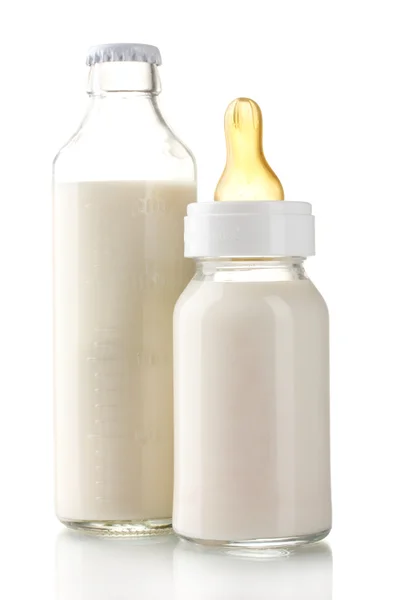 Flessen van melk geïsoleerd op wit — Stockfoto