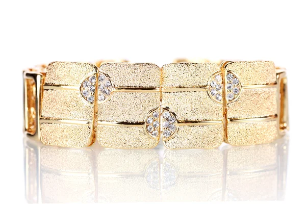 Precioso brazalete dorado con piedras preciosas aisladas en blanco —  Fotos de Stock