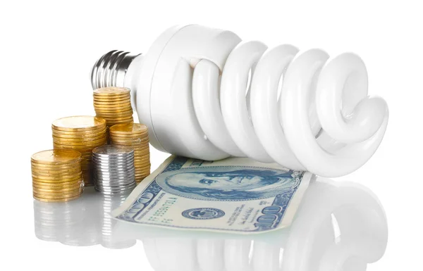 Energy saving lamp and money isolated on white — Stock Photo, Image