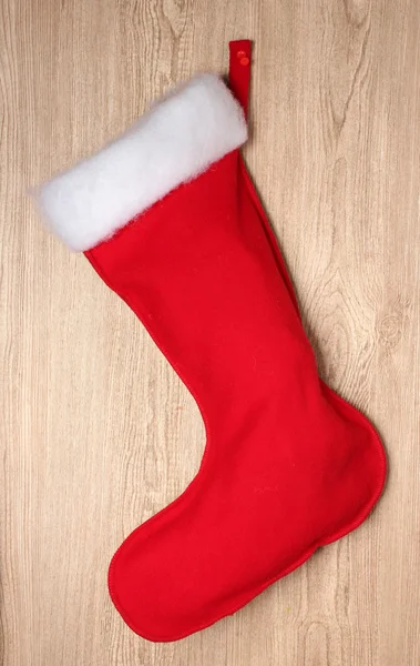 木製の背景のクリスマス靴下 — ストック写真