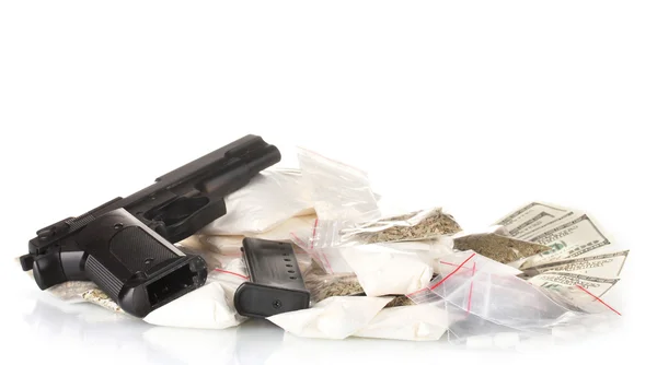 Cocaine and marijuana in packet with gun isolated on white — Stock Photo, Image