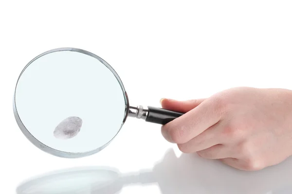 stock image Magnifying glass in hand and fingerprint isolated on white