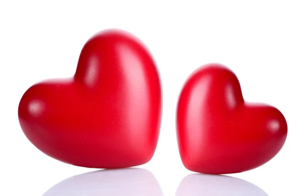 Iki dekoratif kırmızı kalp üzerinde beyaz izole — Stok fotoğraf