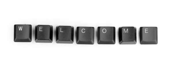 Клавиши клавиатуры, говорящие добро пожаловать, изолированы на белом — стоковое фото