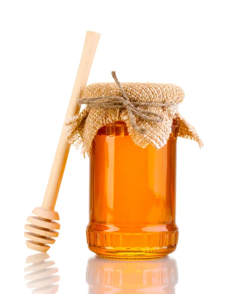 Sladký medu ve sklenici s drizzler izolované na bílém — Stock fotografie