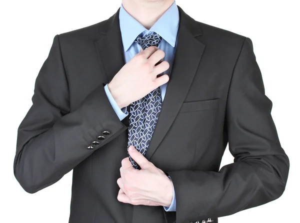 Geschäftsmann korrigiert Krawatte aus nächster Nähe — Stockfoto