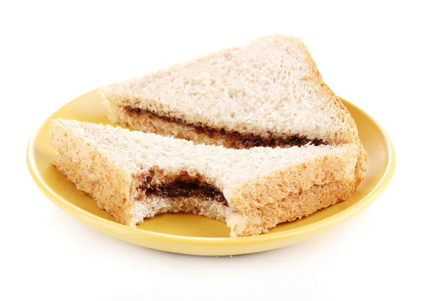 Sanduíches mordidos com chocolate na placa isolada em branco — Fotografia de Stock