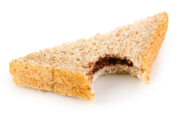 Bitten smörgås med isolerad på vit choklad — Stockfoto