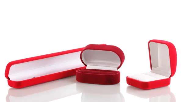 Scatole di gioielli rosse isolate su bianco Fotografia Stock