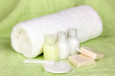 Hotel amenities kit on towel clipart