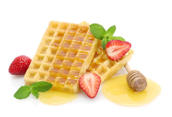 Belgium waffles with honey, strawberries and mint isolated on white — Stock Photo, Image